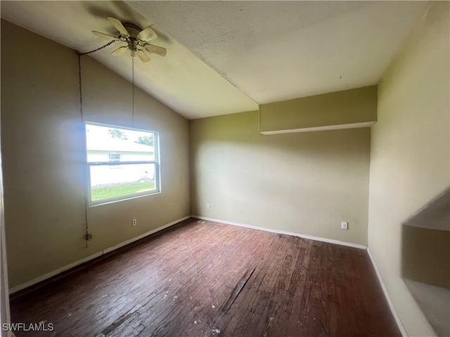 unfurnished room with vaulted ceiling, hardwood / wood-style floors, and ceiling fan