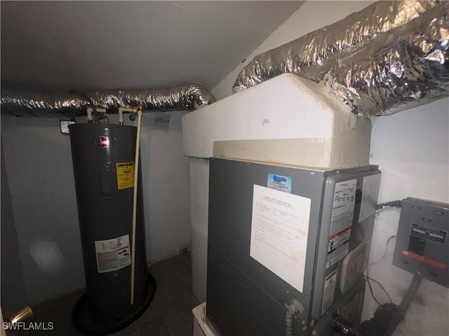 utility room featuring electric water heater and heating unit