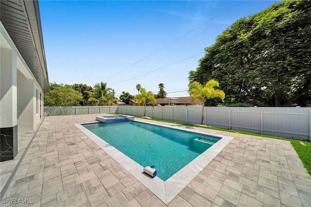 view of swimming pool with a patio