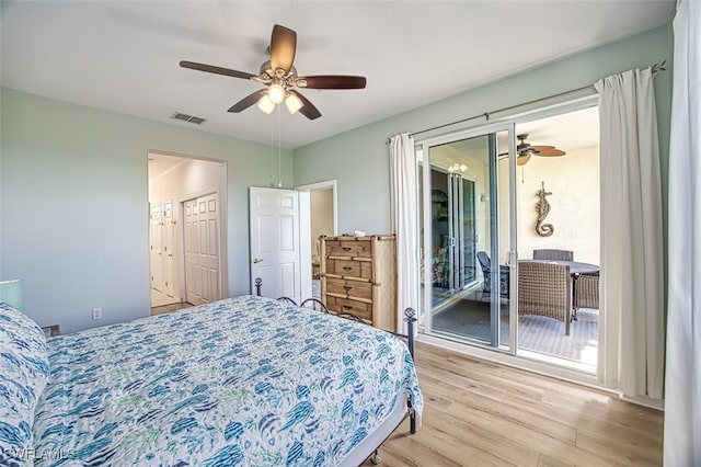 bedroom featuring access to outside, ceiling fan, and light wood-type flooring