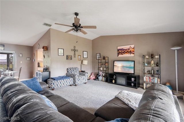 living room with carpet floors, ceiling fan, and lofted ceiling