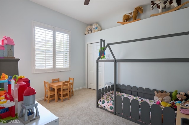 game room featuring light carpet