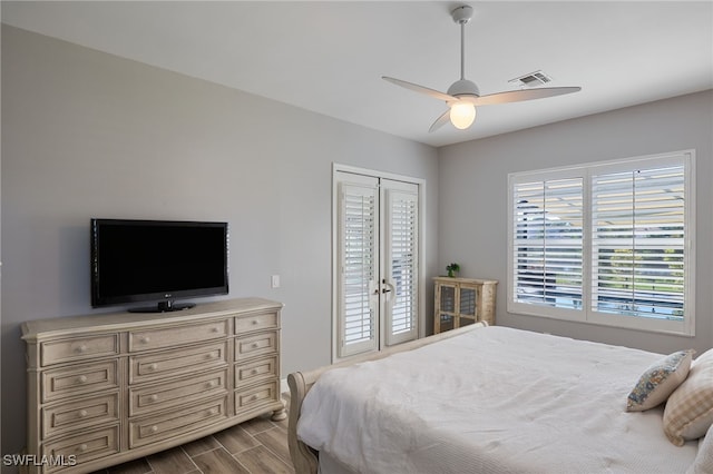 bedroom featuring light hardwood / wood-style floors and ceiling fan