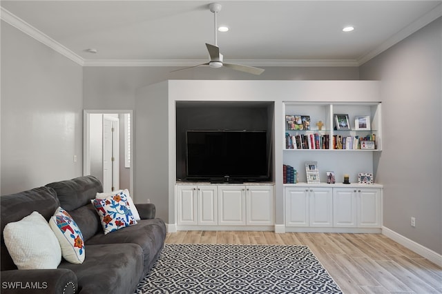 living room featuring ceiling fan, light wood-type flooring, and ornamental molding