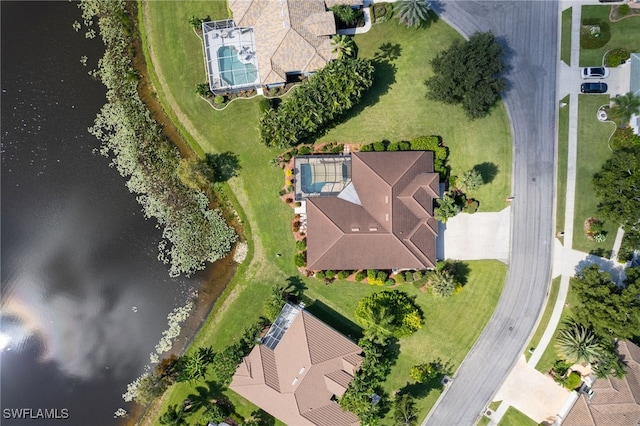 birds eye view of property featuring a water view