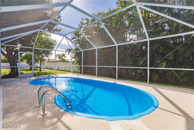 view of pool featuring a lanai and a patio area