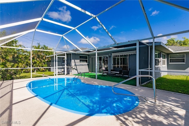 view of pool featuring a patio, a lanai, and a yard