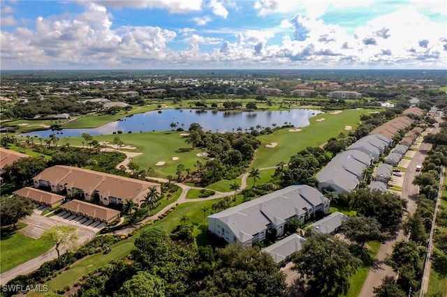 aerial view featuring view of golf course, a water view, and a residential view