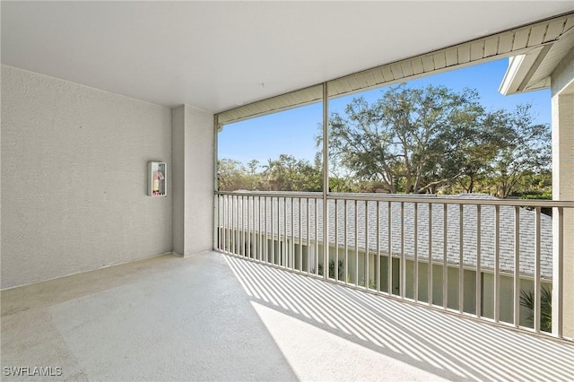 unfurnished sunroom featuring a healthy amount of sunlight