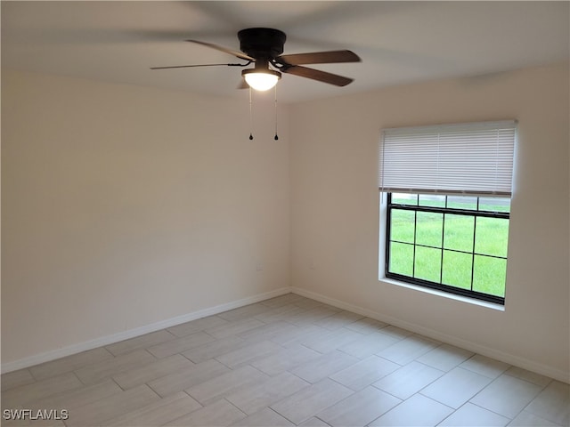 unfurnished room featuring ceiling fan