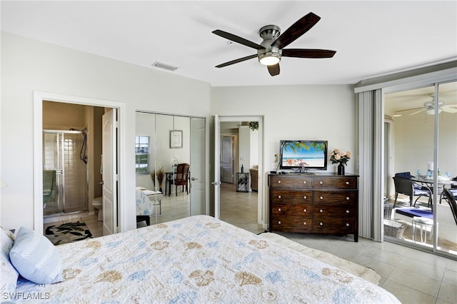 tiled bedroom featuring visible vents, ensuite bathroom, and ceiling fan