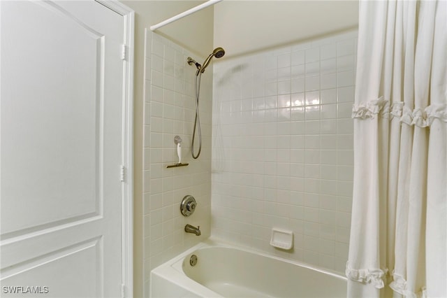 bathroom featuring shower / tub combo