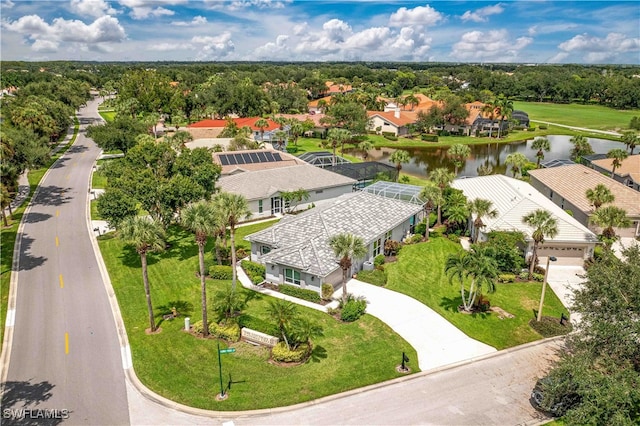 birds eye view of property featuring a water view