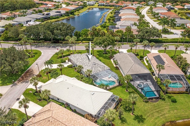 bird's eye view with a water view