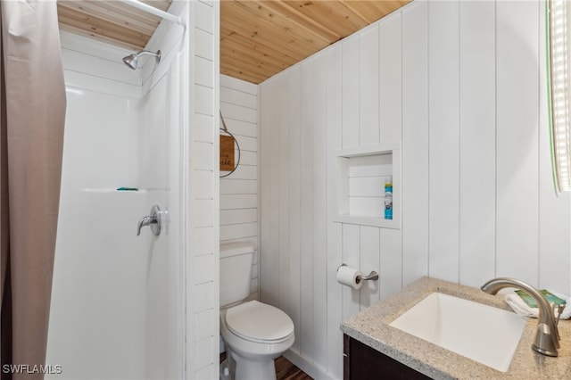 bathroom featuring toilet, wooden ceiling, a shower, and vanity