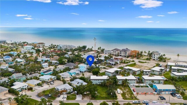 bird's eye view with a residential view and a water view