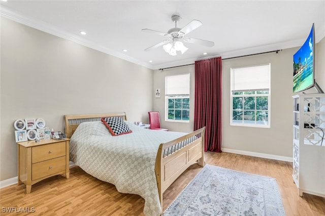 bedroom with ceiling fan, recessed lighting, baseboards, light wood-style floors, and ornamental molding