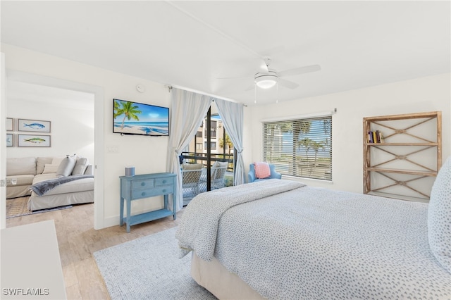 bedroom with ceiling fan, light hardwood / wood-style flooring, and access to exterior