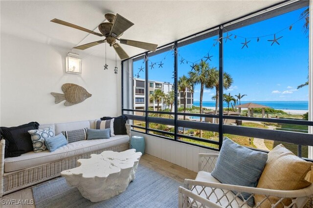 2777 W Gulf Dr Unit 109, Sanibel, FL 33957 - sunroom with a water view and ceiling fan