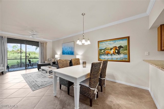 dining area featuring light tile patterned flooring, ceiling fan with notable chandelier, and crown molding