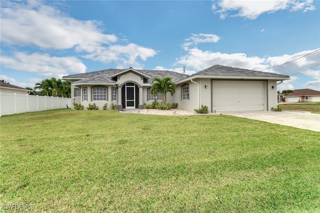 ranch-style home with a garage and a front lawn