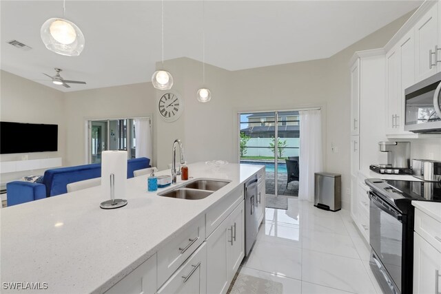 kitchen with stainless steel appliances, sink, ceiling fan, hanging light fixtures, and white cabinets