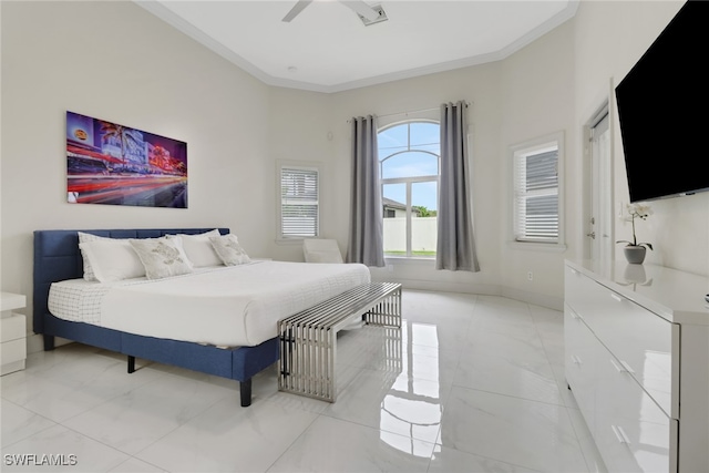 bedroom featuring crown molding and ceiling fan