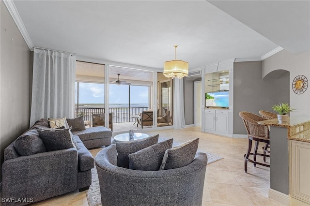 2090 W First St Unit 2007, Fort Myers, FL 33901 - living area featuring ornamental molding, expansive windows, light tile patterned floors, baseboards, and a chandelier