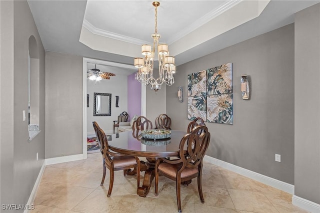 2090 W First St Unit 2007, Fort Myers, FL 33901 - dining space with baseboards, a raised ceiling, arched walkways, and ornamental molding