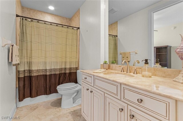 2090 W First St Unit 2007, Fort Myers, FL 33901 - full bathroom with visible vents, toilet, and vanity