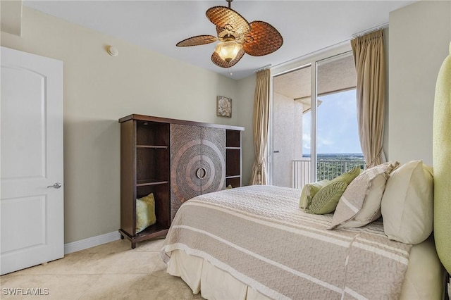 2090 W First St Unit 2007, Fort Myers, FL 33901 - bedroom featuring access to exterior, tile patterned flooring, ceiling fan, and baseboards