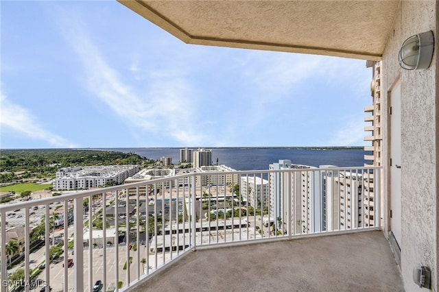 balcony featuring a water view