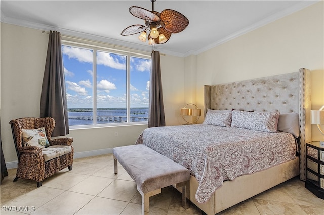 tiled bedroom with ornamental molding, a water view, and ceiling fan