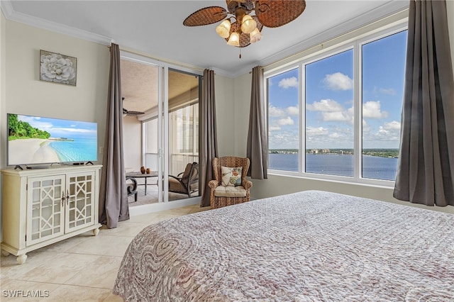 bedroom with a water view, ceiling fan, light tile patterned floors, and crown molding