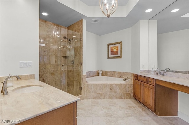 2090 W First St Unit 2007, Fort Myers, FL 33901 - bathroom featuring visible vents, two vanities, a stall shower, a sink, and a bath
