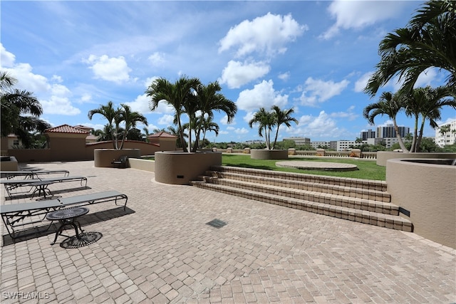 view of patio with a hot tub