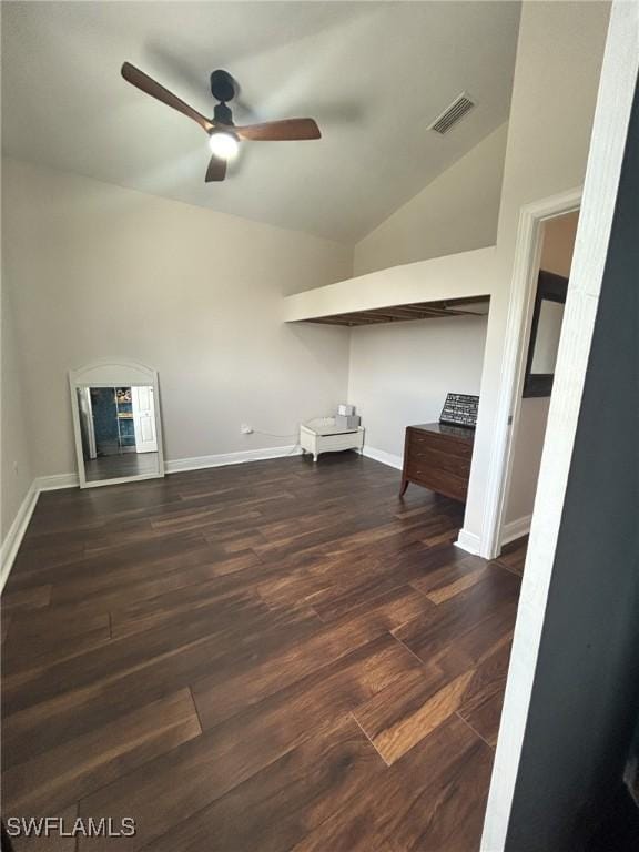 clothes washing area with dark hardwood / wood-style floors and ceiling fan