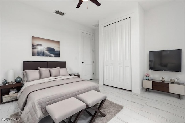 bedroom with a closet and ceiling fan