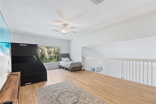 bedroom featuring light hardwood / wood-style floors and ceiling fan