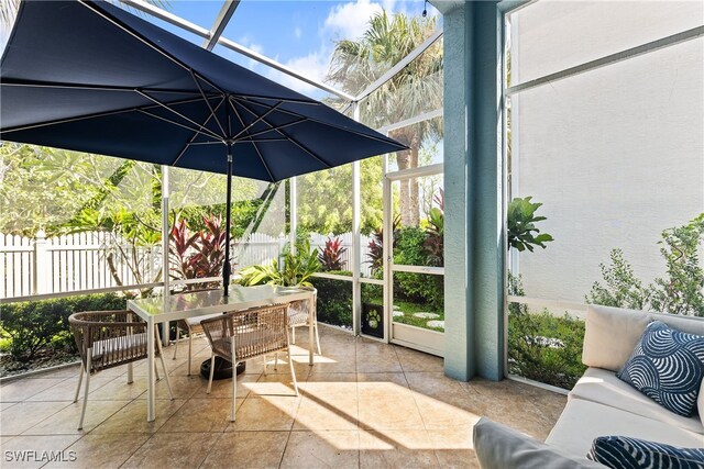 view of patio / terrace with glass enclosure