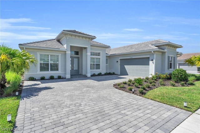 view of front of property featuring a garage