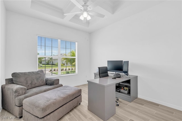 office space with crown molding, coffered ceiling, light hardwood / wood-style flooring, and ceiling fan