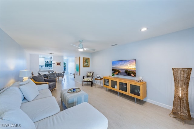 living room featuring ceiling fan