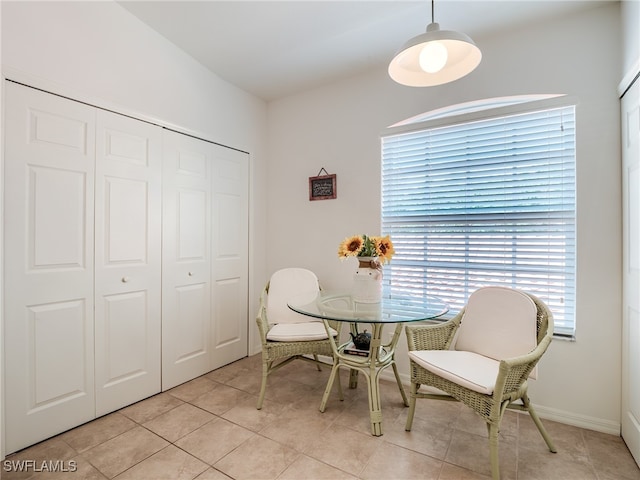 interior space with light tile patterned floors