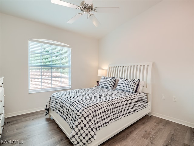 bedroom with ceiling fan and wood-type flooring