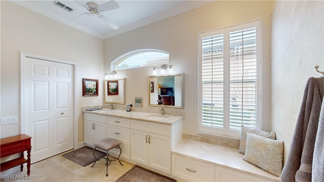 bathroom featuring crown molding, vanity, and ceiling fan