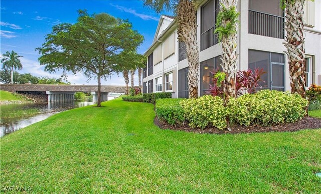 exterior space with a water view