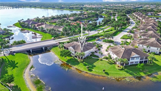 aerial view with a water view and a residential view