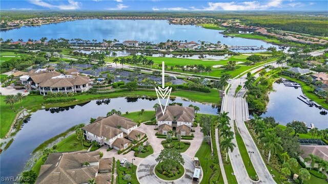 aerial view with a water view and a residential view