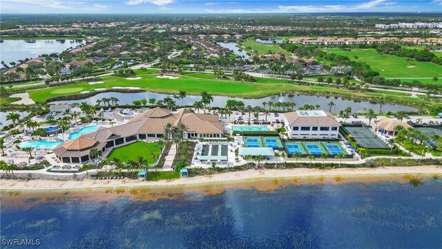 bird's eye view with a water view